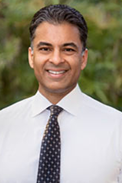 headshot of Asim Khwaja