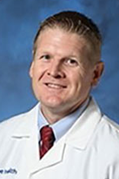 headshot of Freddy Combs